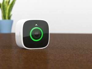 abode Outdoor Smart Camera, on a table